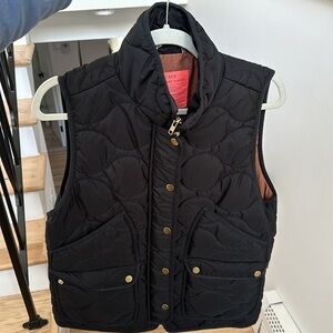 J. Crew black quilted vest with PrimaLoft and gold hardware. Size medium